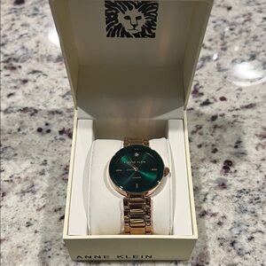 Anne Klein Emerald Dial with Gold Bracelet Watch